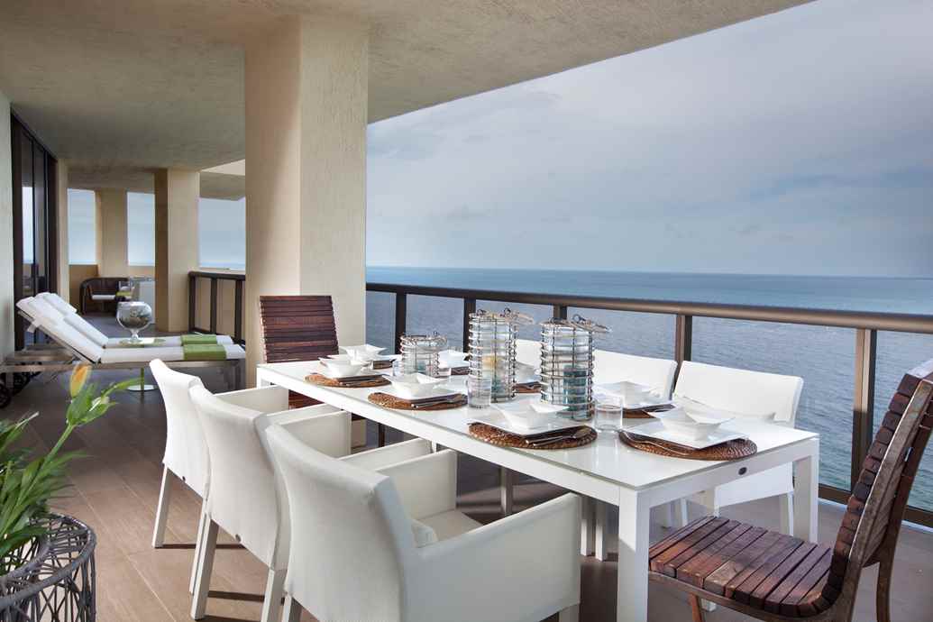 Outdoor Dining Area from the "Sophisticated Getaway" interior design project by DKOR Interiors