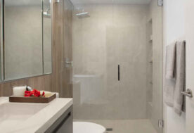 A Neutral Bathroom Design Featuring A Walk-in Shower.