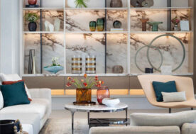 A Neutral Living Room Design Showcasing A Custom-built Wall Unit Adorned With Porcelain Slab.