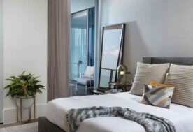 Seamless Connection Between Bedroom Design And Balcony In A Modern Chateau Beach Residence.