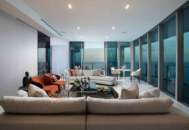 Modern Chateau Beach Residence Living Room Design With An Ocean View.