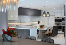 A Seamless Open-concept Dining And Kitchen Space Within The Modern Chateau Beach Residence.