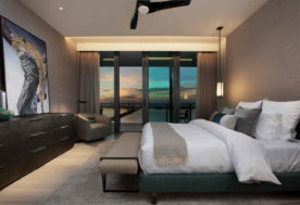 Modern Asian-inspired Penthouse Design Showcasing A Bedroom With A Cityscape And Waterfront View.