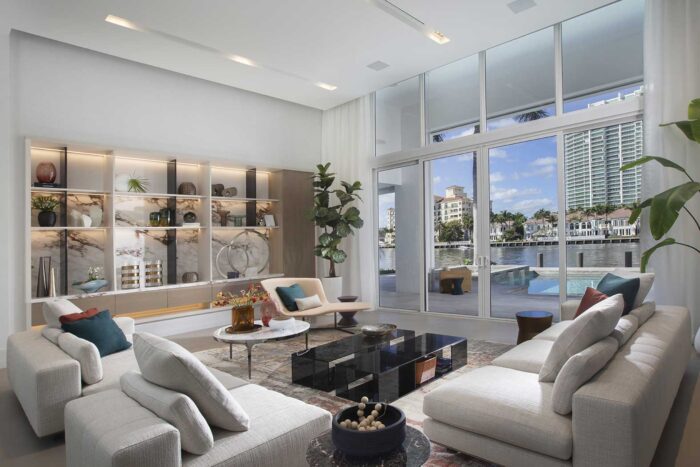 Golden Beach Home Living Room With Custom Shelving Unit Design