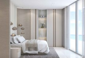 Sophisticated Armani Casa Condo Bedroom, Complete With Pendant Lighting Positioned Above The Bed, Offering An Ocean View.