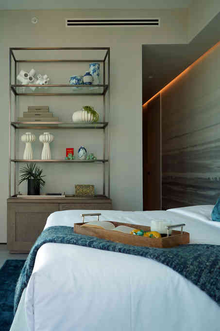 The 'after' state of a VIP bedroom design in a modern Asian penthouse.