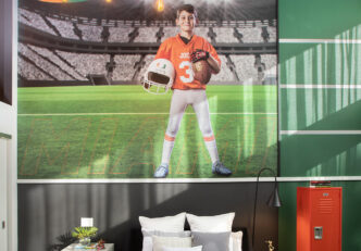 Miami Designers Design A Football-themed Boys' Bedroom Interior Featuring A Custom Football-themed Mural.