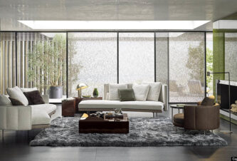 A Living Room Design Featuring A Minotti Torii Sofa.