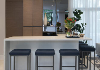An Interior Design Residential Project Featuring A Custom L- Shaped Home Bar By DKOR Interiors.