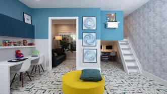 Playroom Ideas Featuring A Playroom  With Blue And Yellow Hues, Dedicated Study Area, And A Reading Nook.
