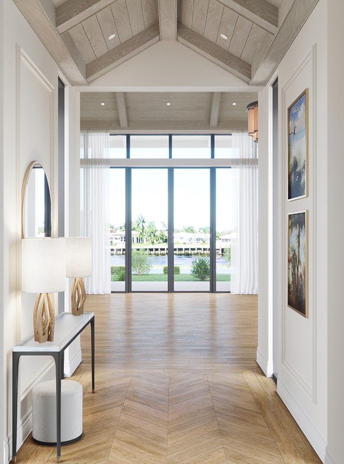 A glimpse of a transitional home entry foyer before its makeover, showcasing an entry table, mirror, paintings, and a scenic water view.