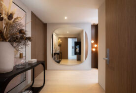 Hallway Design With Mirror In A Beachfront Condo At The Auberge Beach Residences