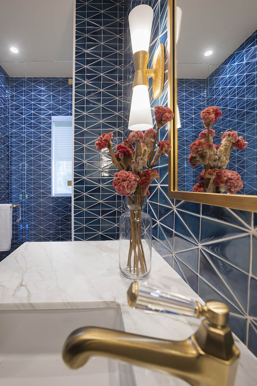 Details of a Sophisticated Traditional Bathroom with Blue Tile