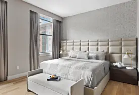 Muted-Moody Master Bedroom In A Manhattan Apartment Design