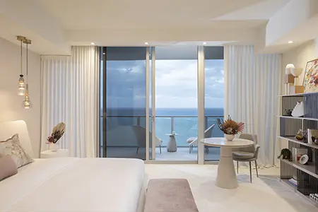 Elegant bedroom design with waterfront views
