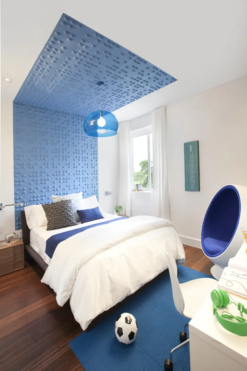 Colorblocking wraps from floor to ceiling in kids' bedroom designs