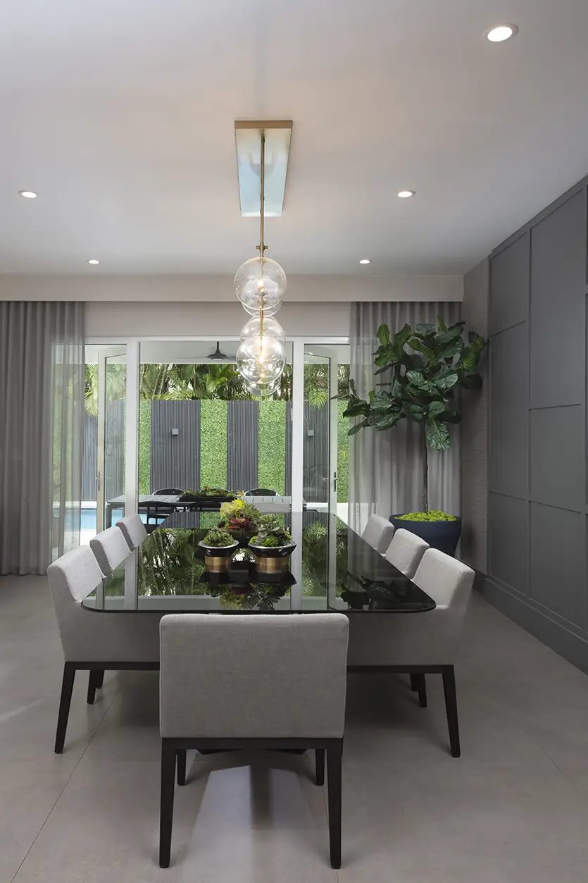 Miami design firm showcases dining room concepts with glass tables